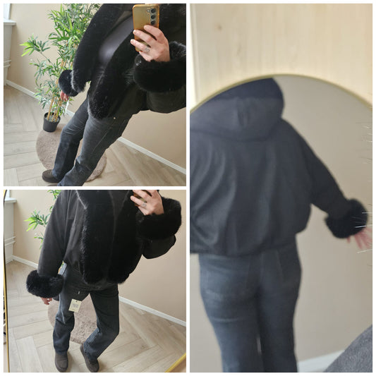 Black fake fur jacket stof