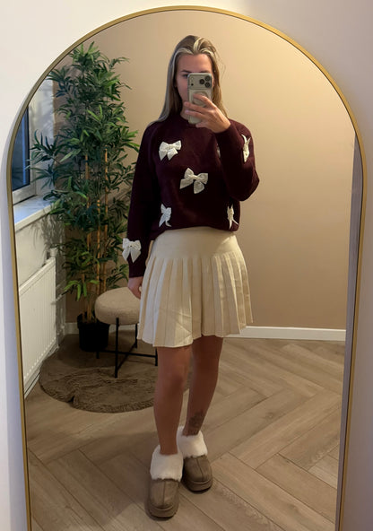 Sweaters met strikjes